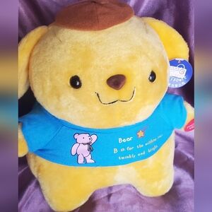 This is a Sanrio Pompompurin plush toy.Pompompurin is a golden retriever DOG.12"